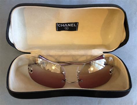 chanel rimless eyeglasses frames|chanel sunglasses with leather sides.